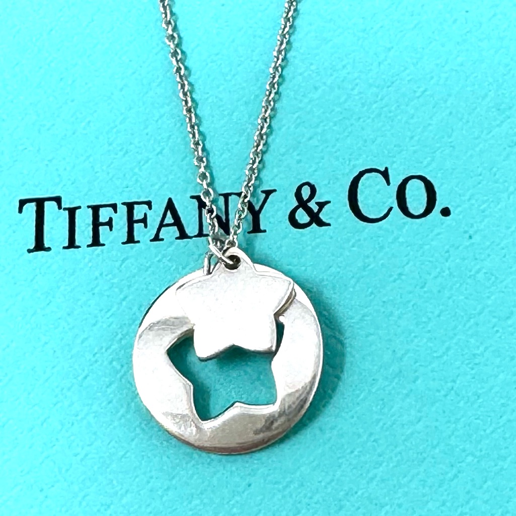 Authentic Tiffany &Co Stencil Cutout Double Star Pendant Necklace.